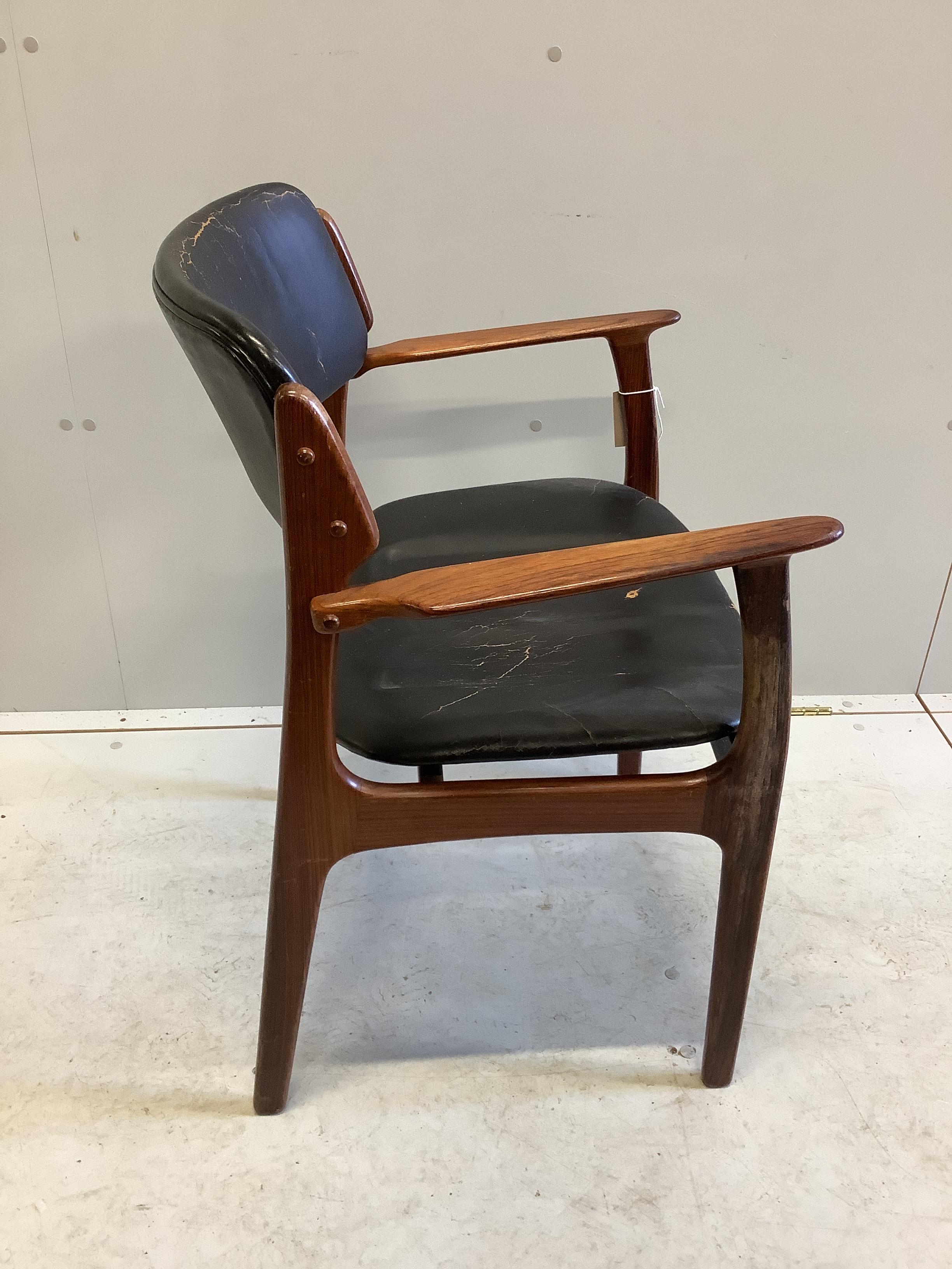 A mid century Danish design rosewood elbow chair, width 58cm, depth 42cm, height 80cm